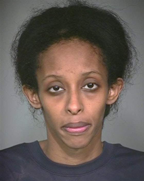 Edyan Farah, 28, was charged with two preliminary counts of neglect of a dependent resulting in death. She remained jailed Tuesday on a $200,000 bond and was scheduled to be formally charged Wednesday.